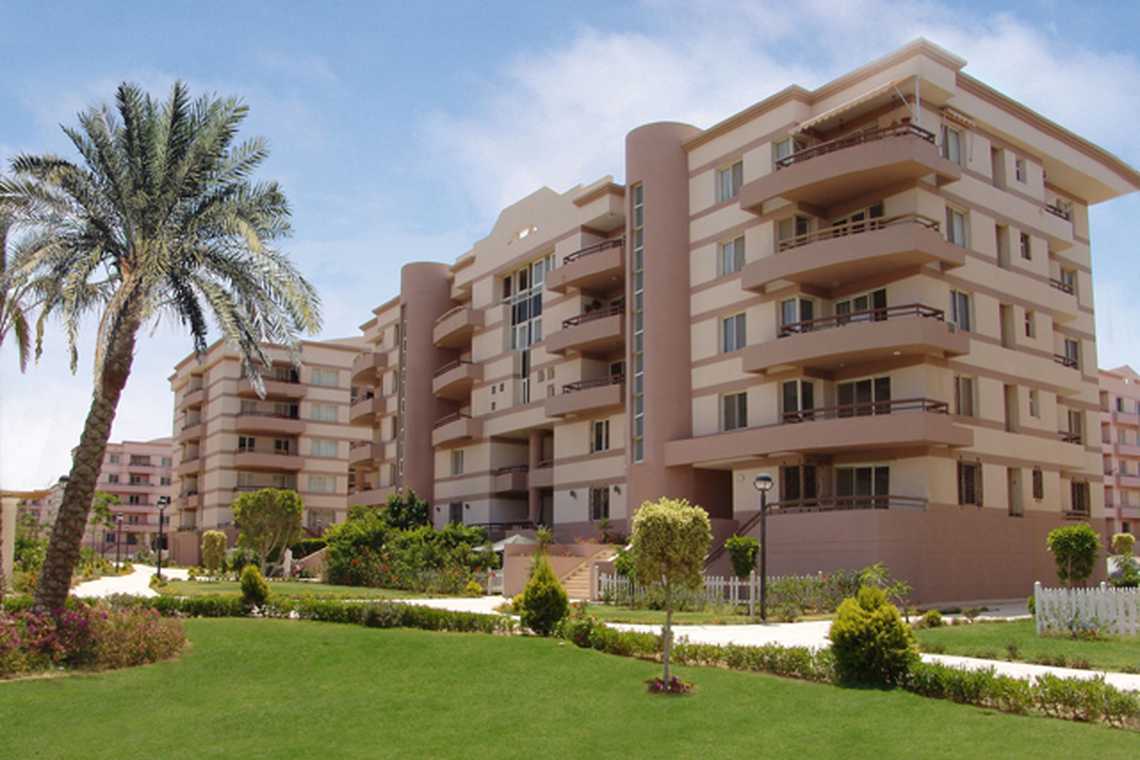 Al Rehab is a self-sufficient private city in New Cairo developed by TMG, featuring modern residential units, international schools, sports clubs, and shopping malls.
